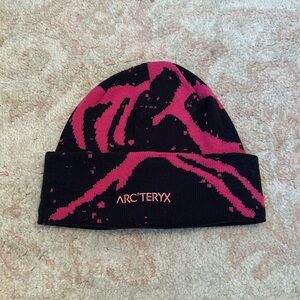 Pink and navy blue arcteryx beanie
